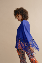 Bobbin lace poncho and woven on a handmade loom in cobalt blue