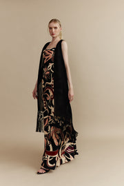 Chaleco de encaje de bolillos y tejido realizado en telar artesanal en color negro